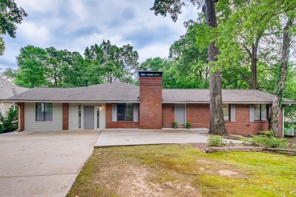 7 bedroom, 4 bathroom, 4,842 sq ft single family residence for sale at 352 Wingo Street, Norcross, GA 30071
