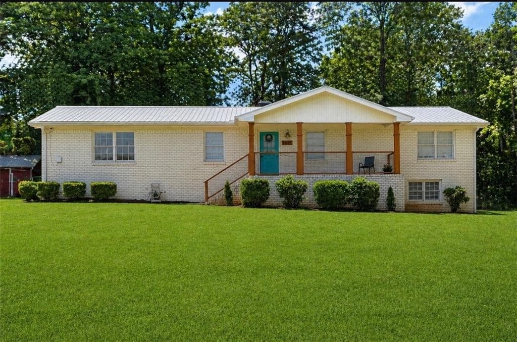 4 bedroom, 3 bathroom, 3,100 sq ft single family residence for sale at 1611 Carlton Avenue, Stone Mountain, GA 30087