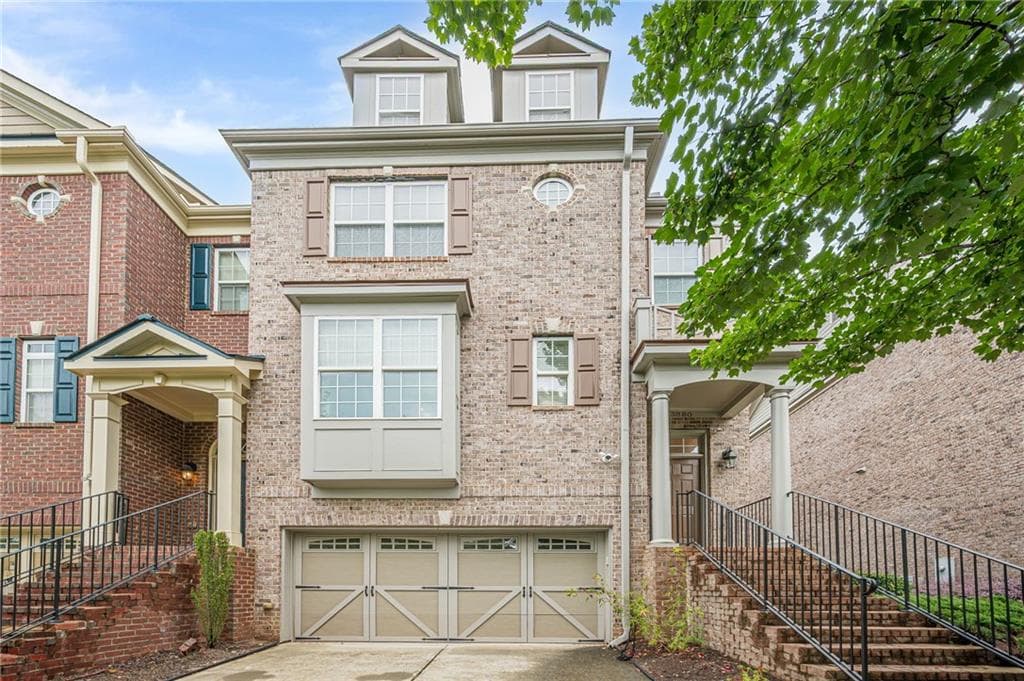 3 bedroom, 4 bathroom, 3,539 sq ft townhouse for sale at 3880 Fairhill Point, Alpharetta, GA 30004