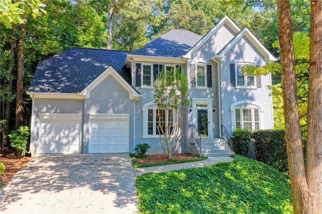 4 bedroom, 4 bathroom, 2,500 sq ft single family residence for sale at 150 Ashewoode Downs Lane, Johns Creek, GA 30005