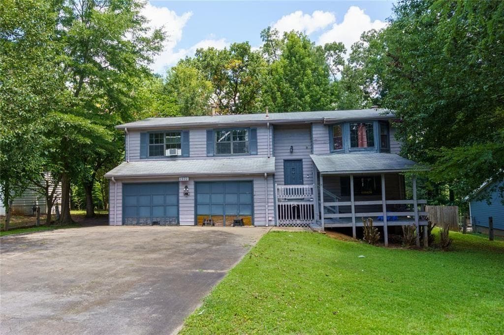 5 bedroom, 3 bathroom, 2,284 sq ft single family residence sold at 2822 WoodHollow Lane, Jonesboro, GA 30236