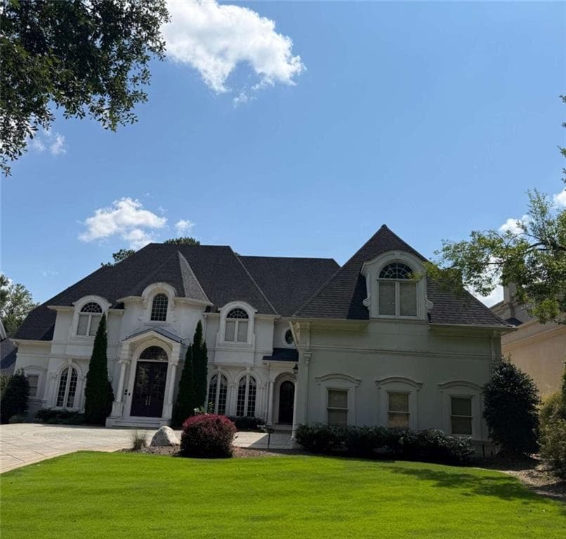 7 bedroom, 7 bathroom, 11,002 sq ft single family residence under contract at 2212 Ascott Valley Trc, Johns Creek, GA 30097