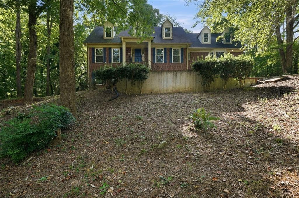 5 bedroom, 4 bathroom, 3,400 sq ft single family residence for sale at 4927 Castlewood Drive, Lilburn, GA 30047
