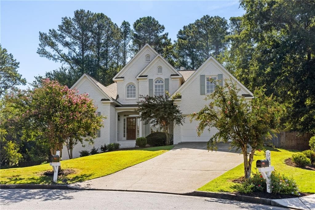 5 bedroom, 4 bathroom, 3,712 sq ft single family residence for sale at 770 Heathland Drive, Roswell, GA 30075