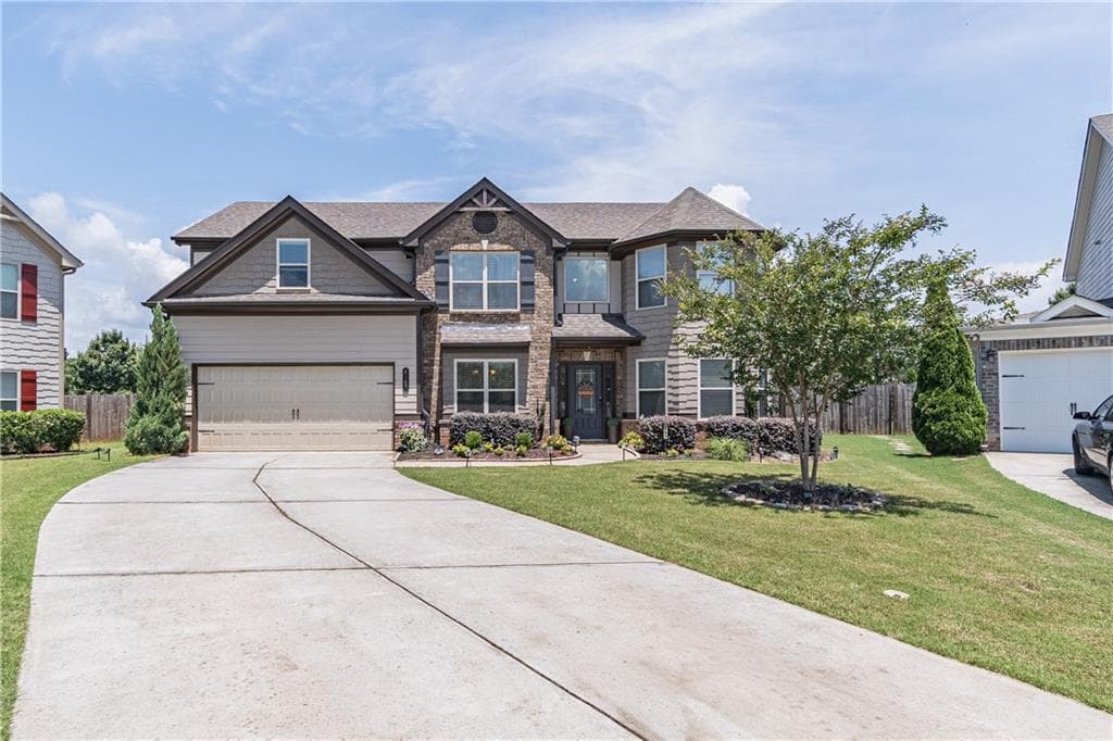 5 bedroom, 3 bathroom, 2,812 sq ft single family residence for sale at 5703 Shore Isle Court, Flowery Branch, GA 30542
