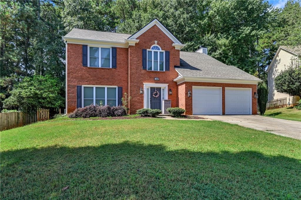 4 bedroom, 3 bathroom, 2,232 sq ft single family residence for sale at 1934 Mclennon Court, Lawrenceville, GA 30043