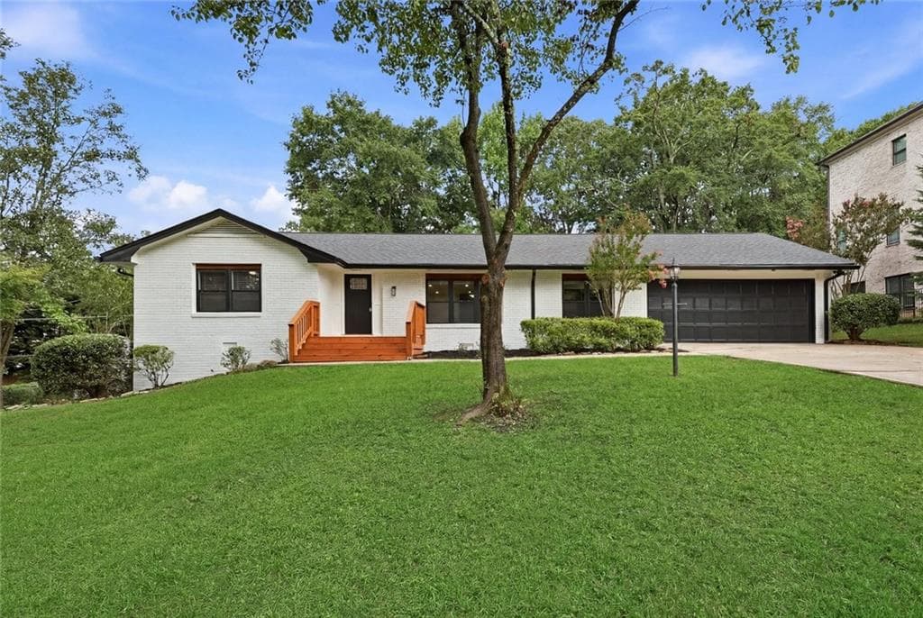 7 bedroom, 4 bathroom, 4,766 sq ft single family residence for sale at 1802 Oak Grove Road, Atlanta, GA 30345