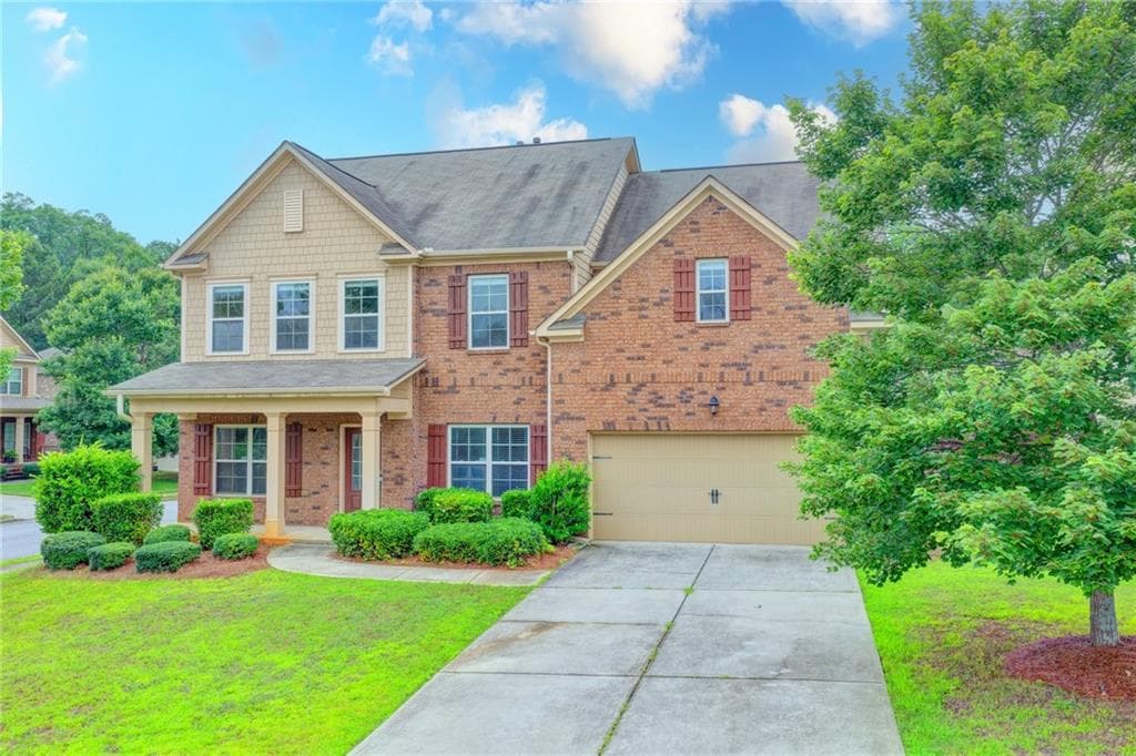 5 bedroom, 4 bathroom, 3,356 sq ft single family residence for sale at 4228 Woods Creek Lane, Suwanee, GA 30024
