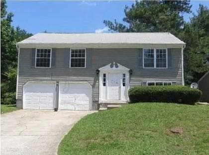 4 bedroom, 2 bathroom, 1,184 sq ft single family residence for sale at 5318 Tracey Drive, Stone Mountain, GA 30088