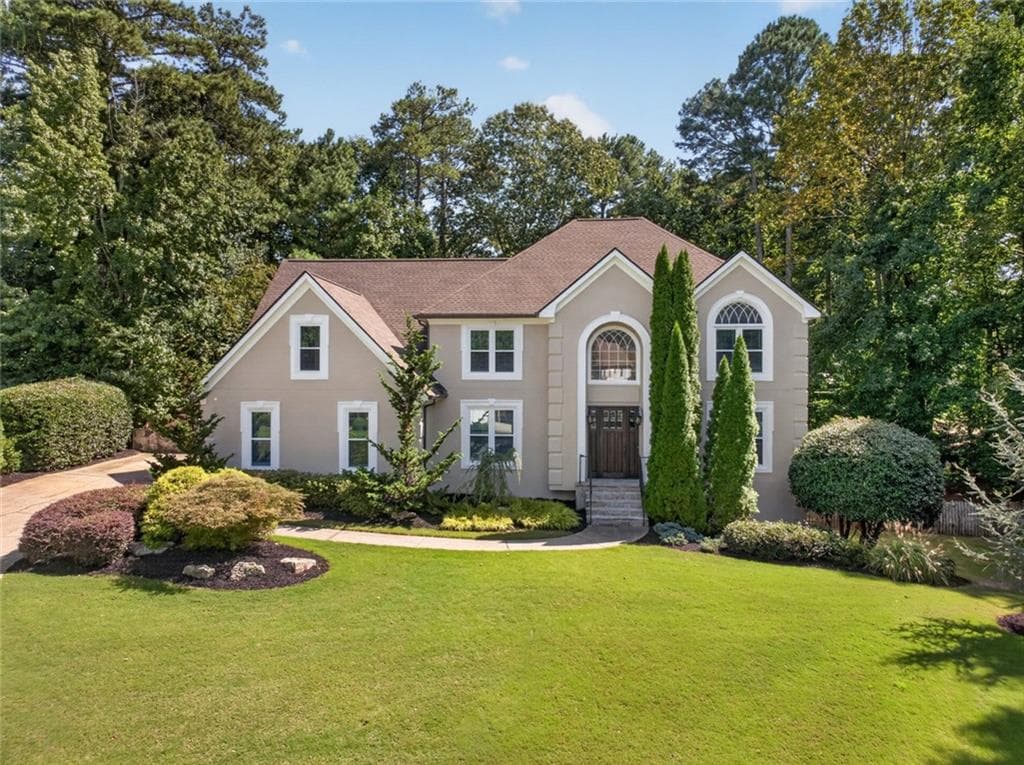 7 bedroom, 5 bathroom, 5,968 sq ft single family residence for sale at 4490 Barony Drive, Suwanee, GA 30024