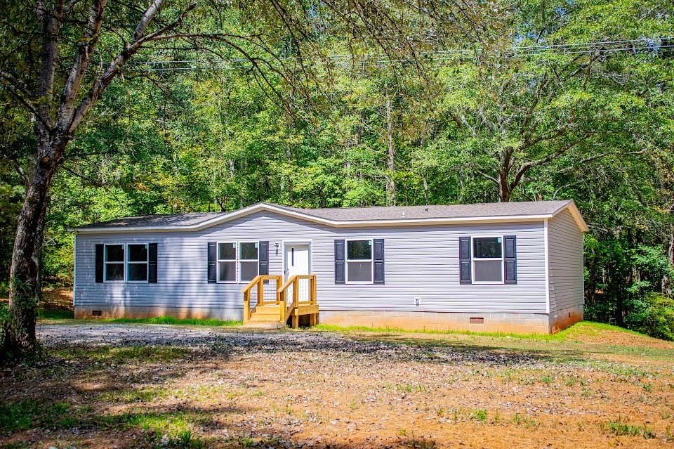 4 bedroom, 2 bathroom, 1,568 sq ft single family residence for sale at 238 Old Lowell Mill Road, Carrollton, GA 30116