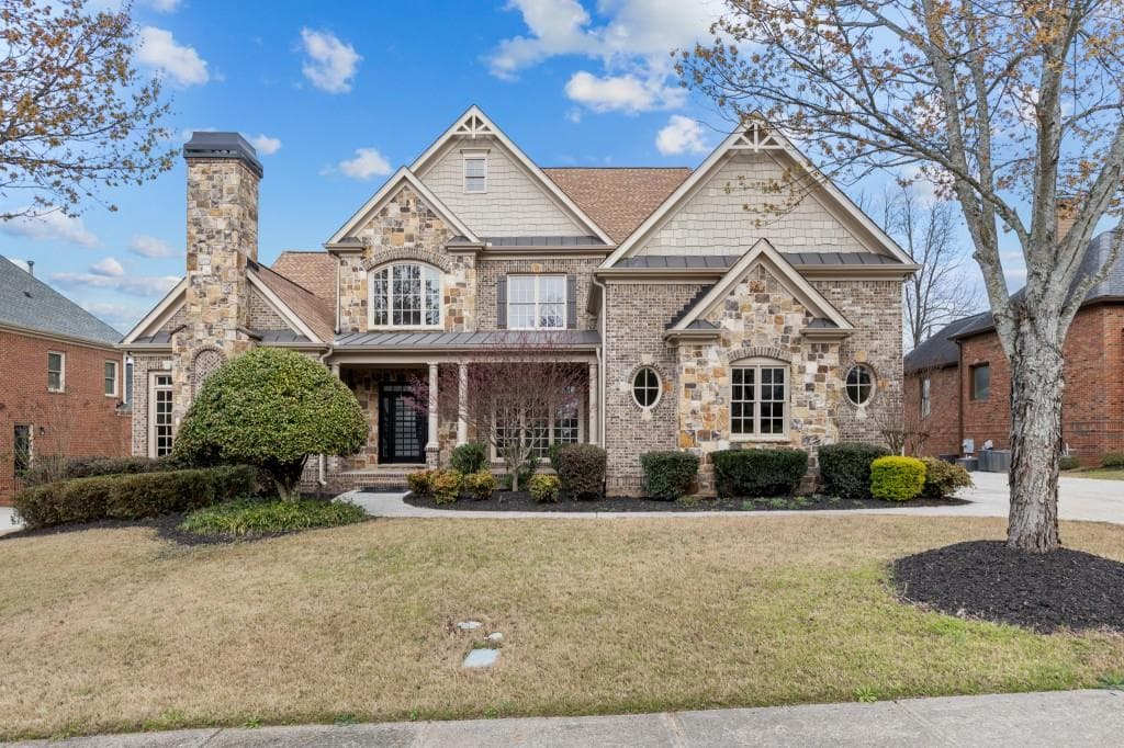 6 bedroom, 6 bathroom, 7,604 sq ft single family residence for sale at 2302 Walkers Glen Lane, Buford, GA 30519