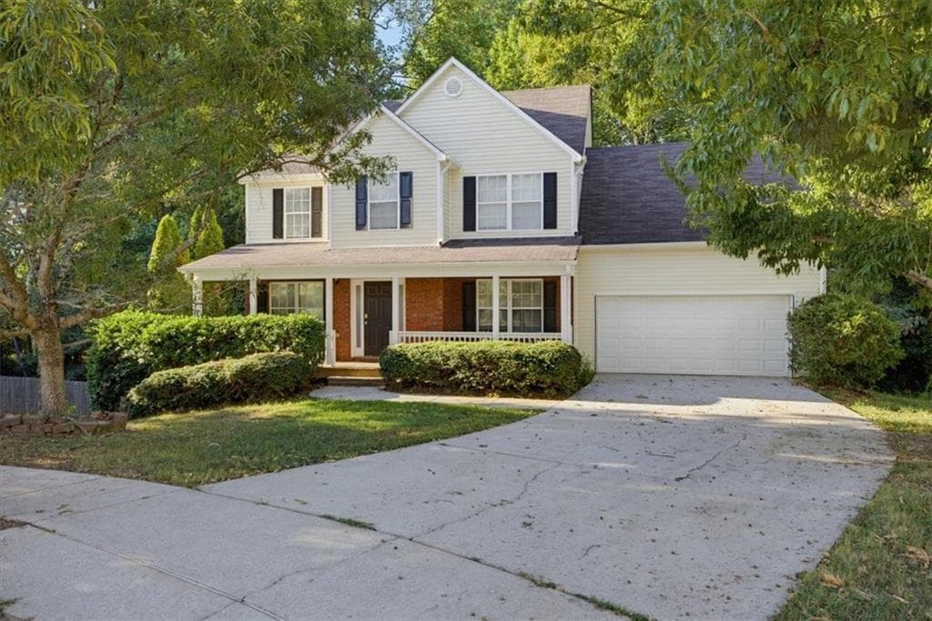 4 bedroom, 3 bathroom, 1,998 sq ft single family residence for sale at 310 Rockingham Drive, Loganville, GA 30052