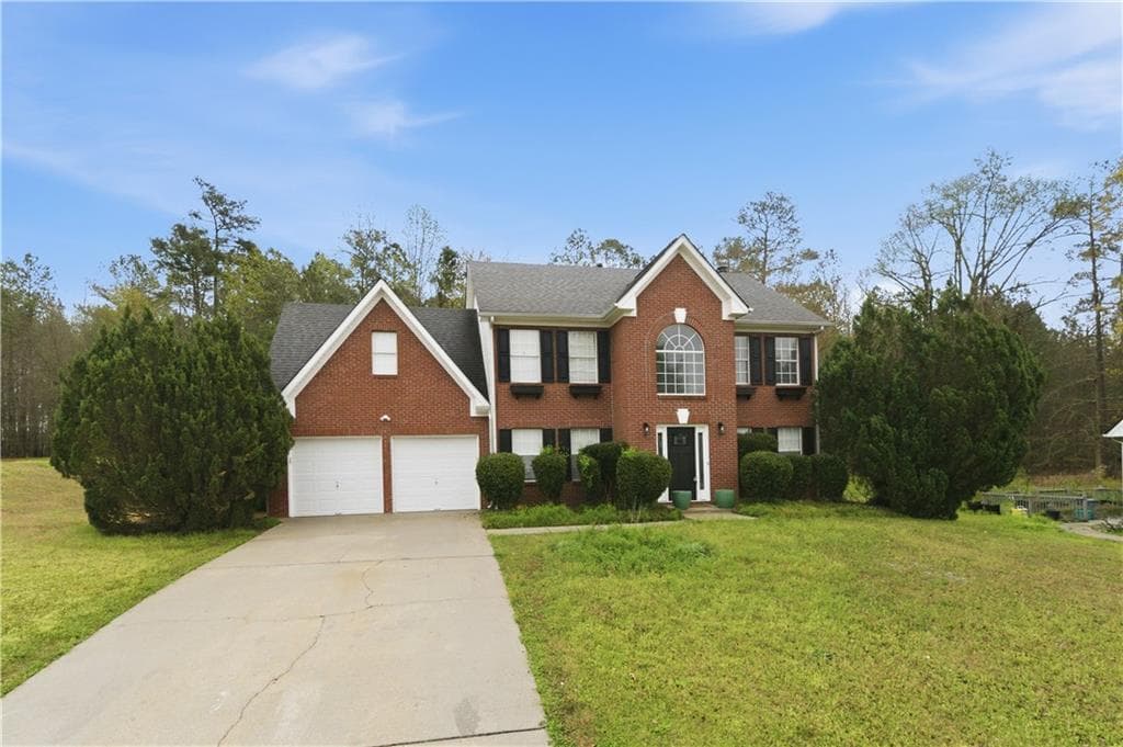 4 bedroom, 3 bathroom, 2,156 sq ft single family residence for sale at 9360 Carnes Crossing Circle, Jonesboro, GA 30236