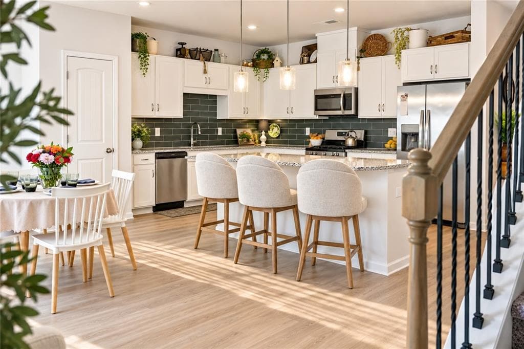 3 bedroom, 3 bathroom, 1,990 sq ft townhouse for sale at 1074 Chastain Drive, Sugar Hill, GA 30518