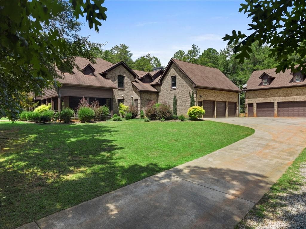 8 bedroom, 8 bathroom, 7,160 sq ft single family residence for sale at 106 Big Buck Court, Jackson, GA 30233