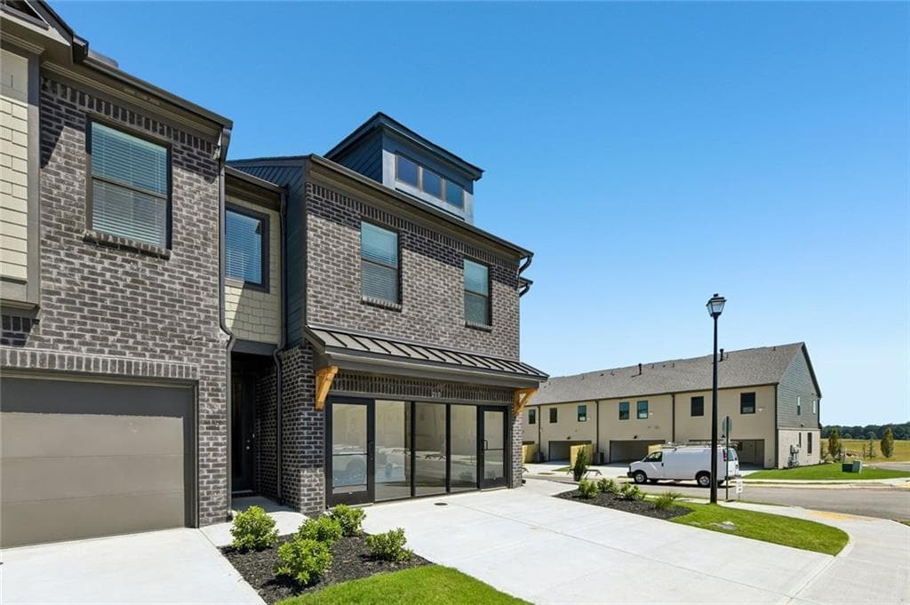 3 bedroom, 3 bathroom, 1,745 sq ft townhouse for sale at 218 Foxtrot Avenue, Hoschton, GA 30548