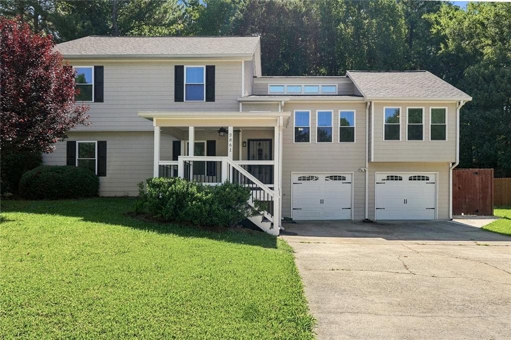 4 bedroom, 3 bathroom, 1,686 sq ft single family residence for sale at 3861 Nowlin Road, Kennesaw, GA 30144