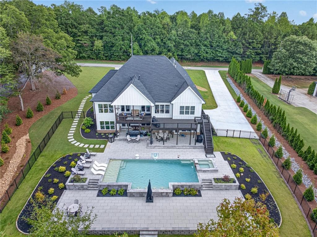 5 bedroom, 4 bathroom, 7,135 sq ft single family residence for sale at 2218 Shoal Creek Road, Buford, GA 30518