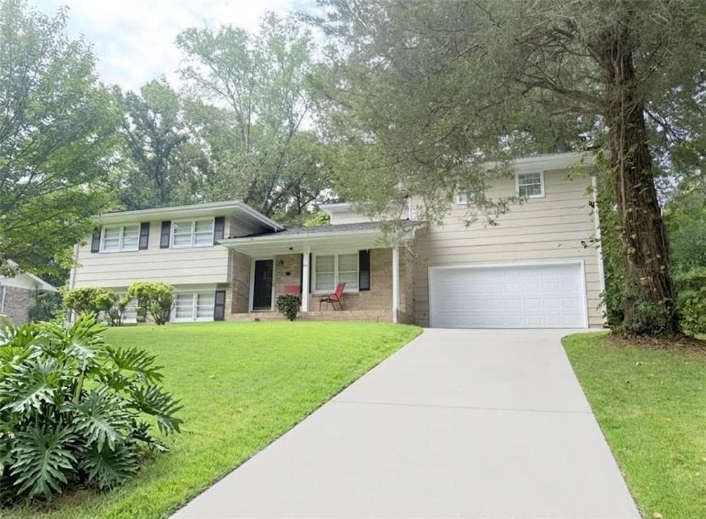5 bedroom, 4 bathroom, 1,610 sq ft single family residence for sale at 927 Magna Carta Drive, Atlanta, GA 30318