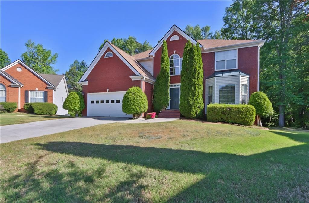 5 bedroom, 4 bathroom, 4,019 sq ft single family residence for sale at 1403 Elderberry Run Cove, Lawrenceville, GA 30043