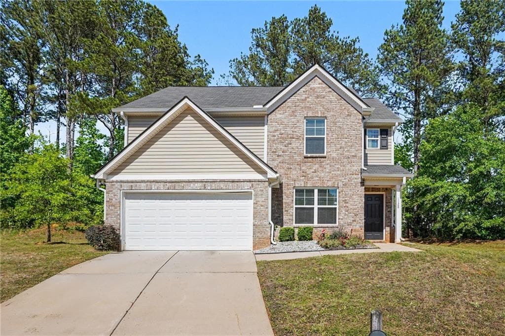 4 bedroom, 3 bathroom, 1,928 sq ft single family residence for sale at 1128 Oak Hollow Lane, Hampton, GA 30228