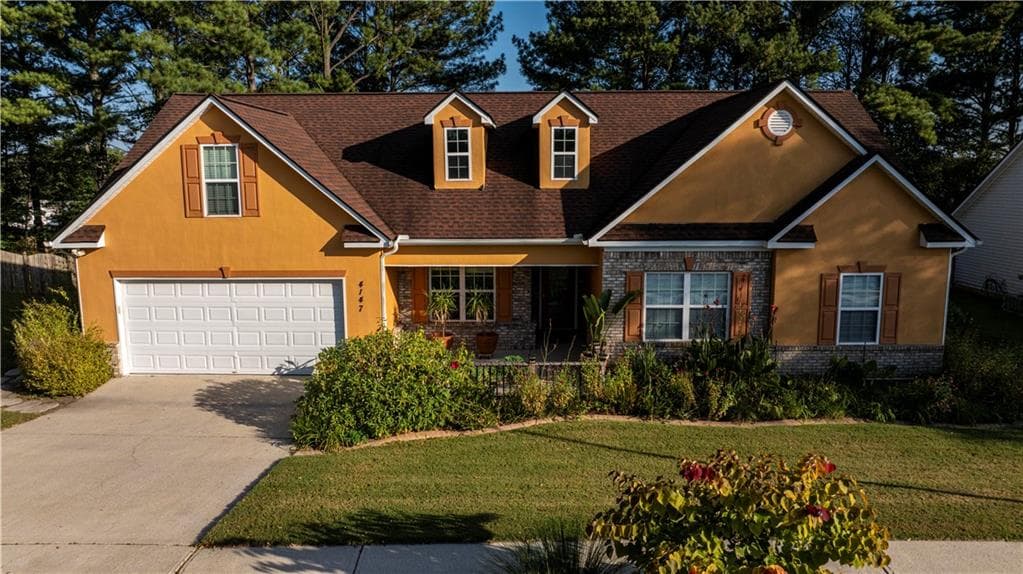 4 bedroom, 3 bathroom, 2,050 sq ft single family residence for sale at 4147 Granite Falls Lane, Loganville, GA 30052