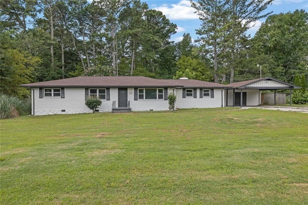3 bedroom, 2 bathroom, 1,610 sq ft single family residence for sale at 1563 Rockbridge Road, Stone Mountain, GA 30087