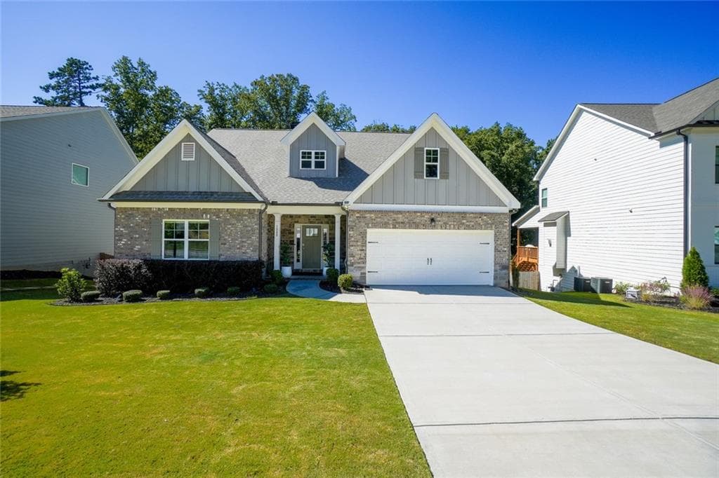 4 bedroom, 3 bathroom single family residence for sale at 1880 Grand Lanier Drive, Buford, GA 30518