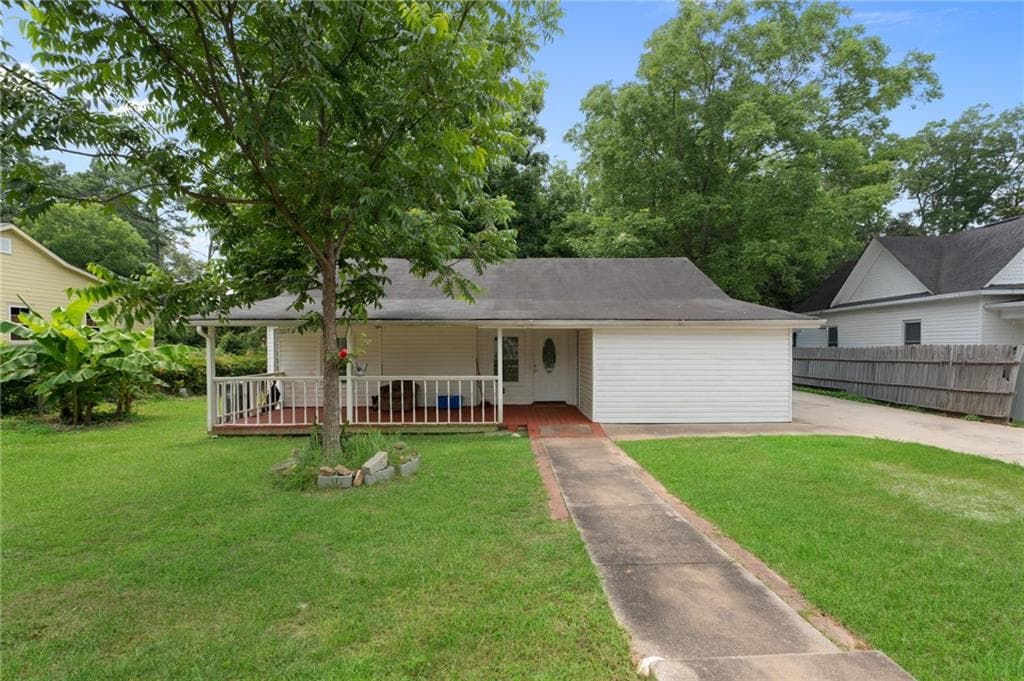 5 bedroom, 3 bathroom, 1,160 sq ft single family residence for sale at 123 South Avenue, Jonesboro, GA 30236