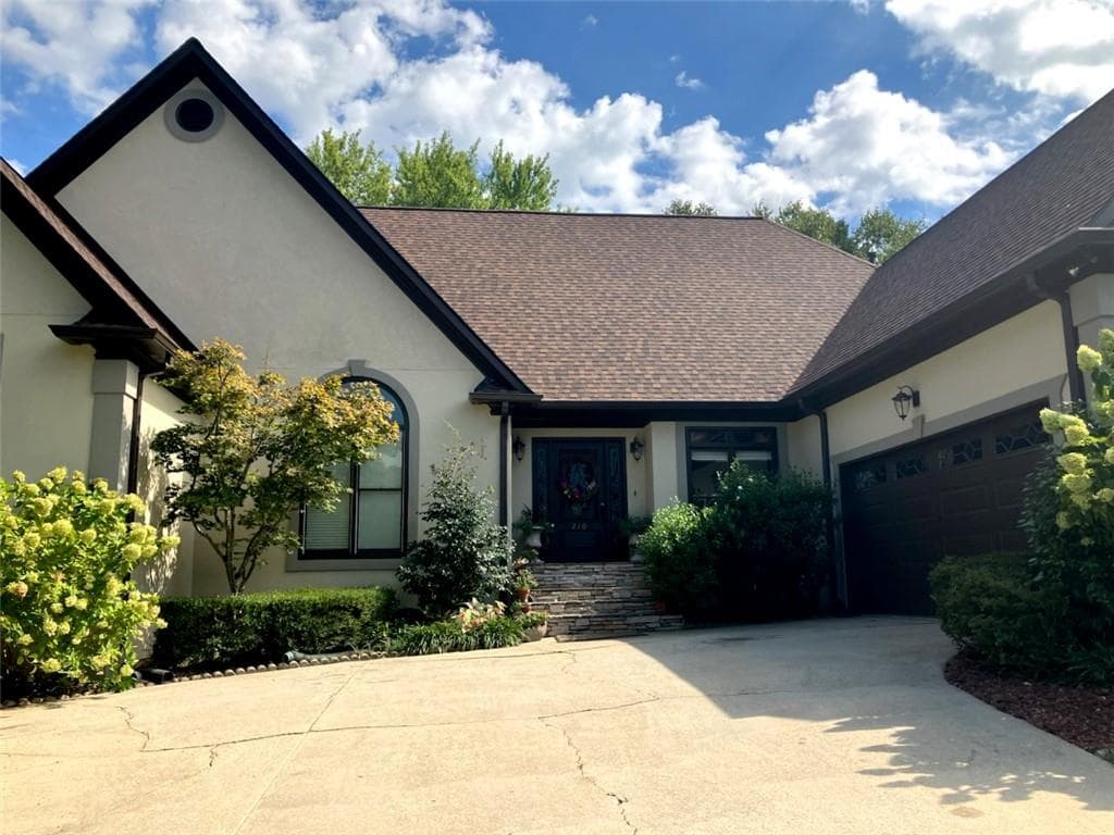 6 bedroom, 4 bathroom, 3,970 sq ft single family residence for sale at 210 Pear Valley Court, Johns Creek, GA 30022