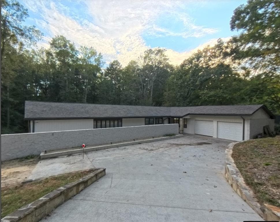 8 bedroom, 6 bathroom, 5,572 sq ft single family residence for sale at 1351 Paces Forest Drive, Atlanta, GA 30327
