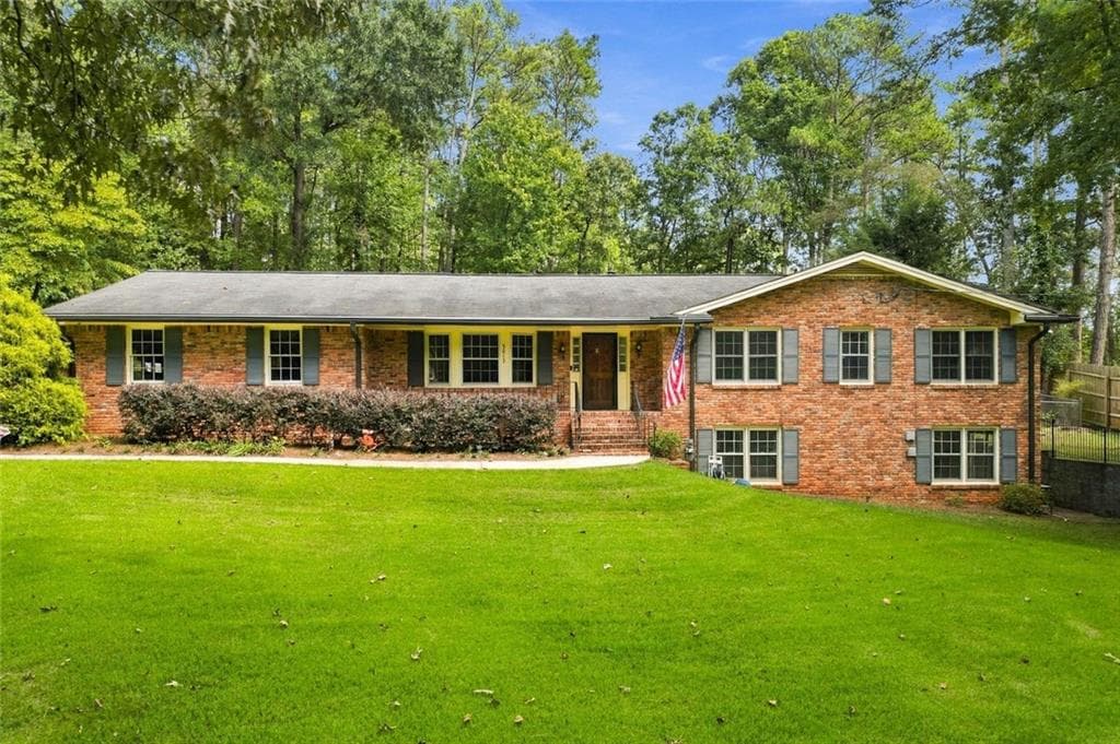 4 bedroom, 3 bathroom, 3,589 sq ft single family residence for sale at 5013 Fox Forest Circle, Lilburn, GA 30047