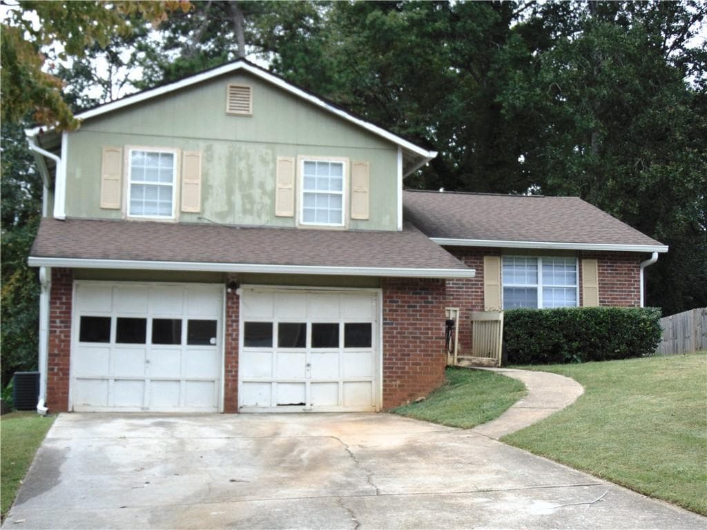3 bedroom, 2 bathroom, 1,452 sq ft single family residence for sale at 1187 Mannbrook Drive, Stone Mountain, GA 30083