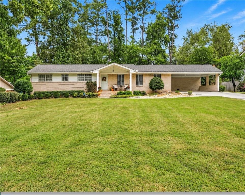 3 bedroom, 2 bathroom, 1,880 sq ft single family residence for sale at 2338 Kings Point Drive, Dunwoody, GA 30338