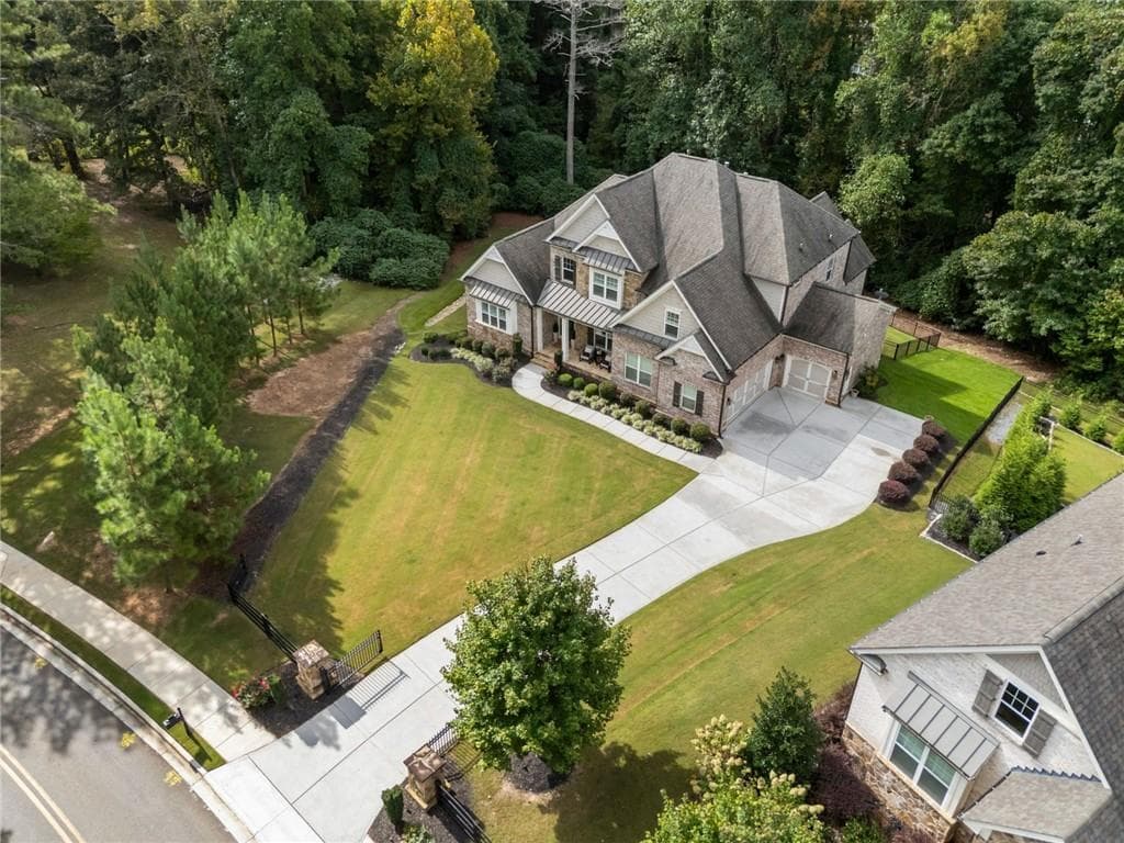 6 bedroom, 6 bathroom, 7,080 sq ft single family residence for sale at 7559 Bates Drive, Alpharetta, GA 30004