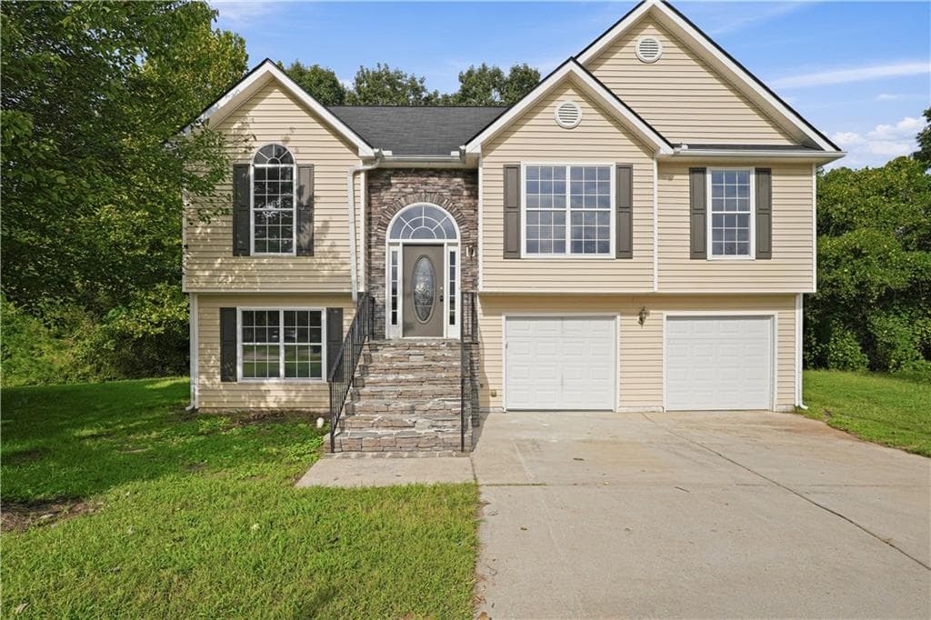 4 bedroom, 3 bathroom, 2,080 sq ft single family residence for sale at 5129 Buchli Crest Court, Lithonia, GA 30038