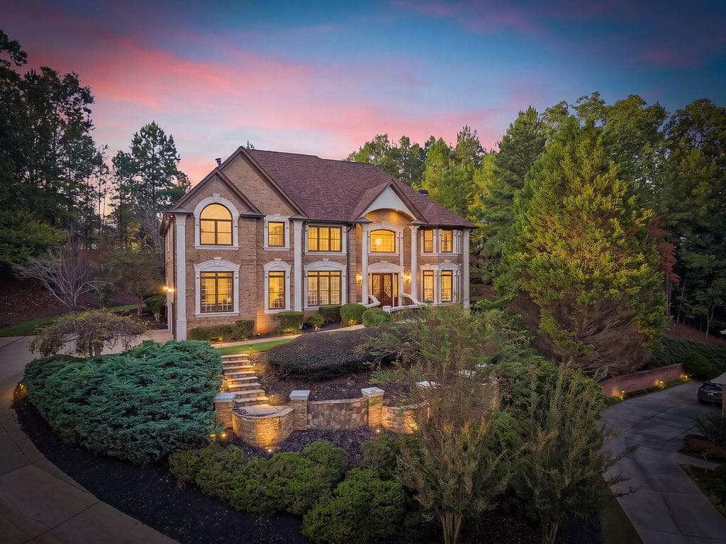 6 bedroom, 7 bathroom, 7,202 sq ft single family residence for sale at 8585 Royal Troon Drive, Duluth, GA 30097