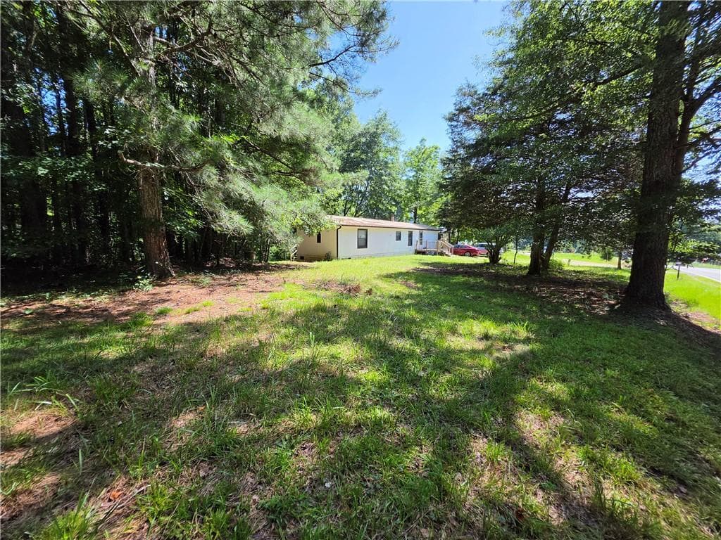 2 bedroom, 2 bathroom, 924 sq ft single family residence for sale at 5170 Hurt Bridge Road, Cumming, GA 30028