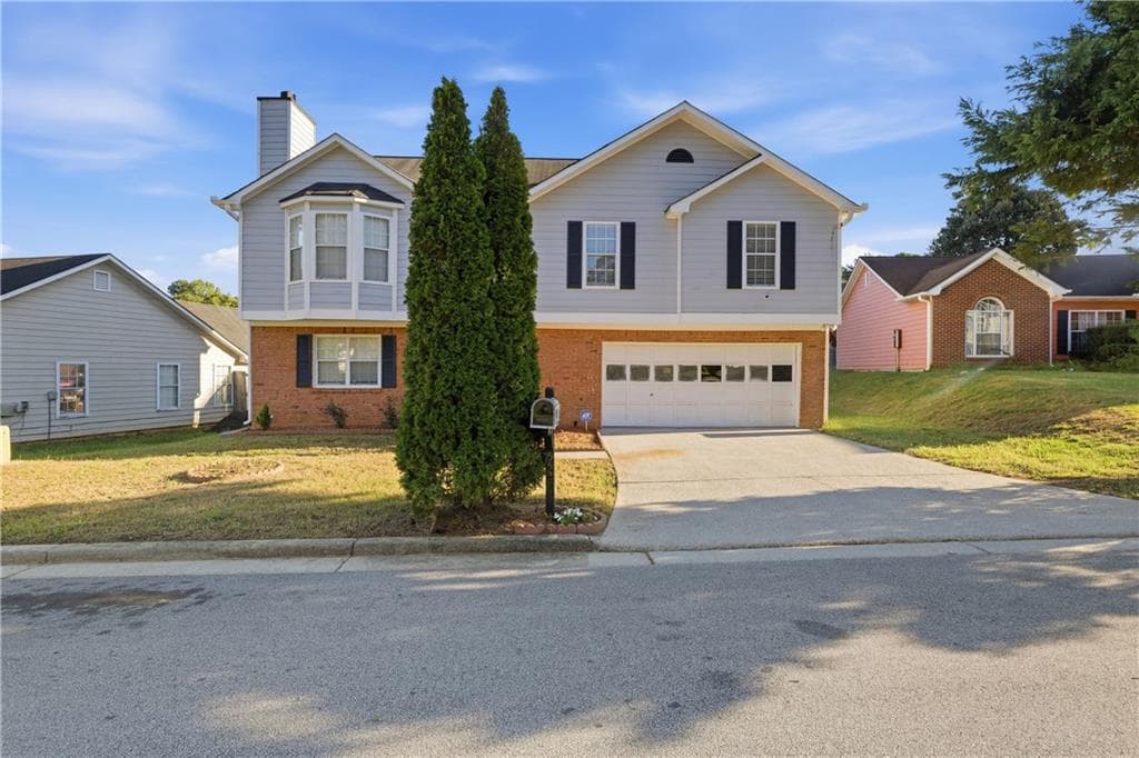 4 bedroom, 3 bathroom, 1,923 sq ft single family residence for sale at 5527 Tunbridge Wells Road, Lithonia, GA 30058