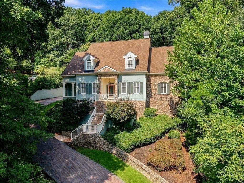 5 bedroom, 6 bathroom, 7,288 sq ft single family residence for sale at 7560 Bridgegate Court, Sandy Springs, GA 30350