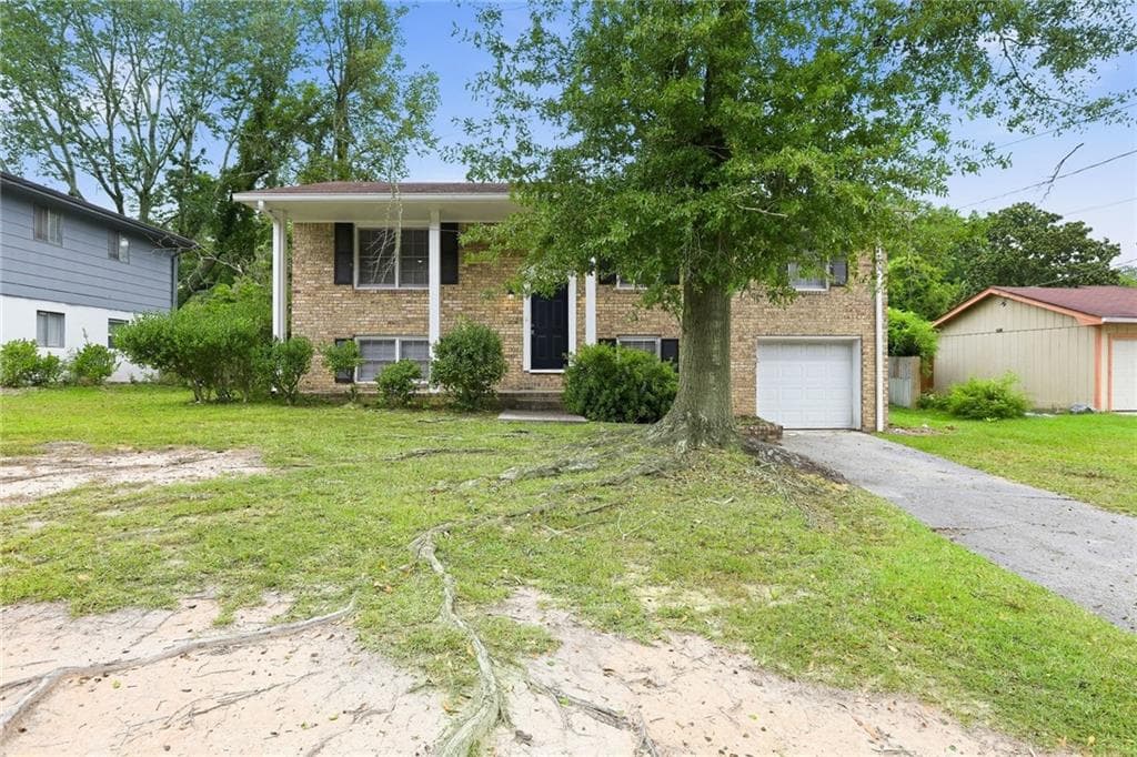 4 bedroom, 2 bathroom, 1,242 sq ft single family residence for rent at 6450 Ashdale Drive, Atlanta, GA 30349 for $2,070 a month