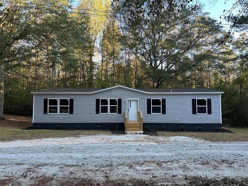 4 bedroom, 2 bathroom, 1,568 sq ft single family residence for sale at 238 Old Lowell Mill Road, Carrollton, GA 30116
