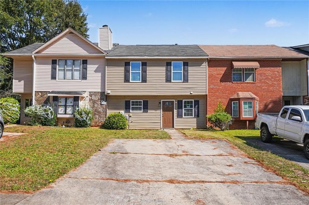2 bedroom, 3 bathroom, 1,584 sq ft townhouse for sale at 8228 Canyon Forge Drive, Riverdale, GA 30274