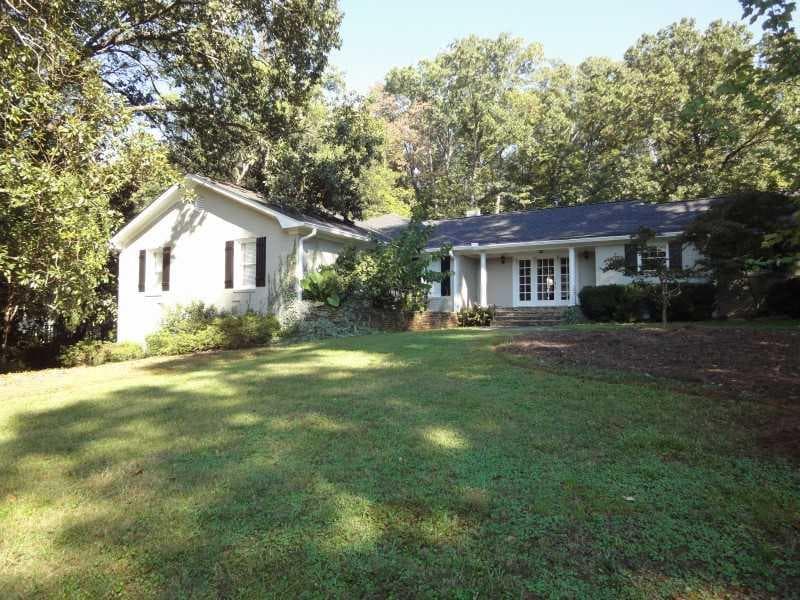 5 bedroom, 4,661 sq ft single family residence sold at 1817 W Wesley Road, Atlanta, GA 30327