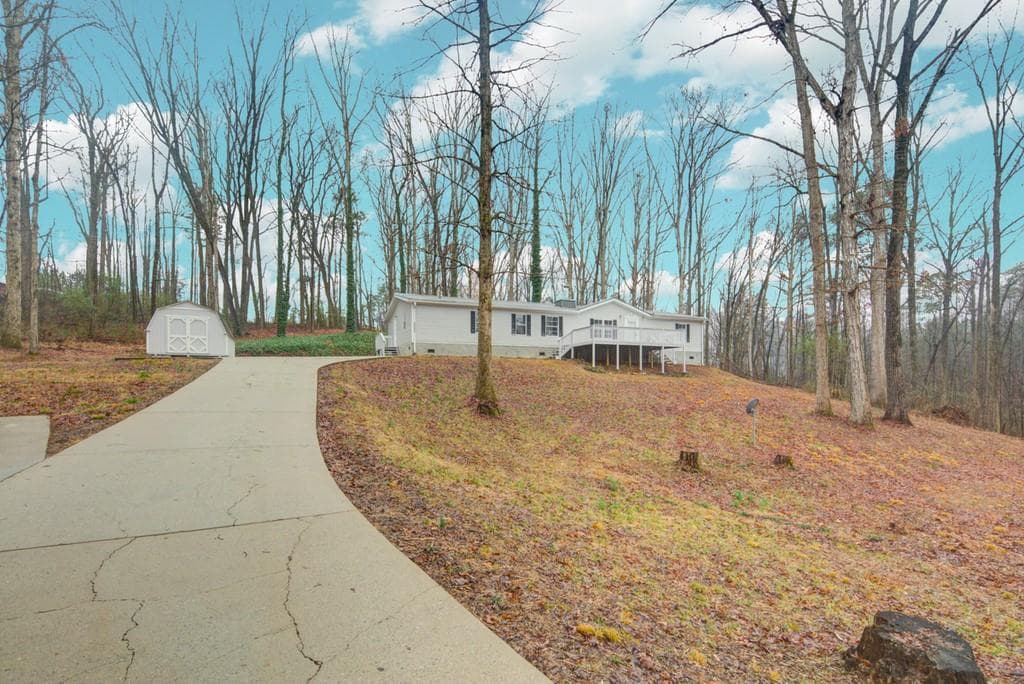 4 bedroom, 2 bathroom, 1,976 sq ft single family residence sold at 6680 George Court, Cumming, GA 30041