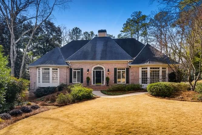 4 bedroom, 6 bathroom, 6,047 sq ft single family residence sold at 915 Curlew Court, Atlanta, GA 30327