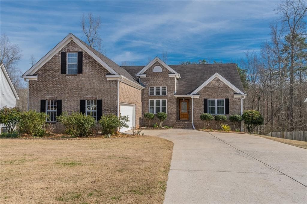 4 bedroom, 3 bathroom, 3,940 sq ft single family residence sold at 8030 Garden Oak Court, Cumming, GA 30041