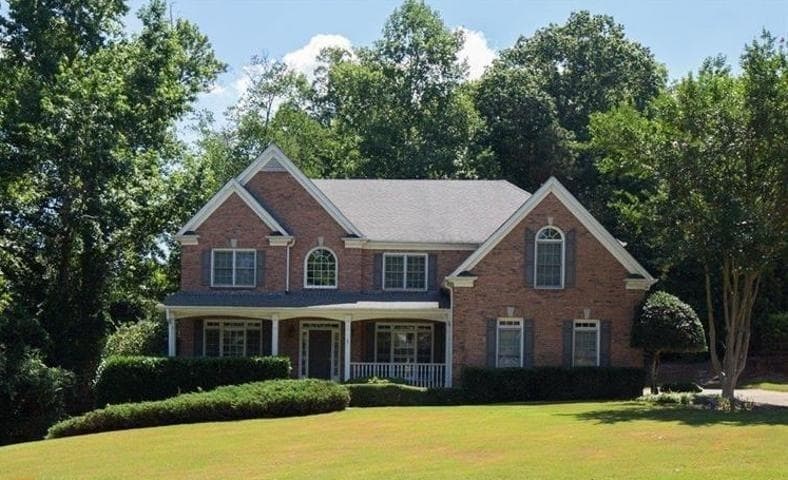 4 bedroom, 5 bathroom, 4,597 sq ft single family residence sold at 1405 Woodland Trace, Cumming, GA 30041