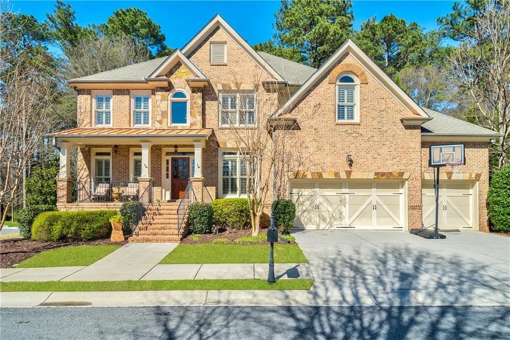 6 bedroom, 5 bathroom, 5,074 sq ft single family residence sold at 10014 Inisfree Drive, Johns Creek, GA 30022
